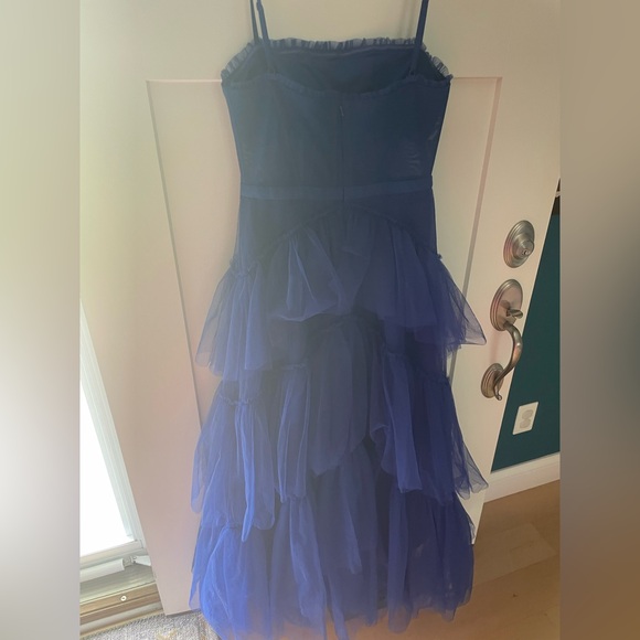 It is made of a mesh material, it is see through on the stomach only, blue dress - Picture 8 of 10